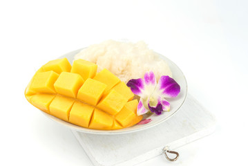mango and sticky rice,Thai style tropical dessert on white background