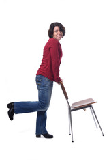 woman standing with a chair in white background