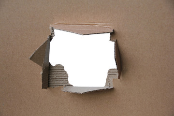 empty blank cardboard form, craft paper, a hole with a straight cut and roughly torn edge, concept of secrecy, tracking, spying, blank for the designer, close-up, copy space