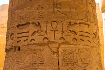 Karnak Temple, Temple Ruins, Embossed hieroglyphics on columns. Great Hypostyle Hall.