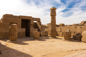 Fototapeta na wymiar Karnak Temple, Temple Ruins, Embossed hieroglyphics on columns. Great Hypostyle Hall.