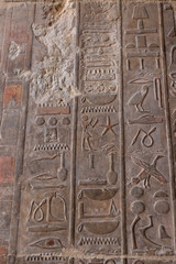 Karnak Temple, Temple Ruins, Embossed hieroglyphics on columns. Great Hypostyle Hall.	