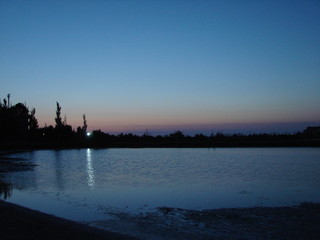 Natural picture of a clear moonlit night over the coast of the Azov Sea.