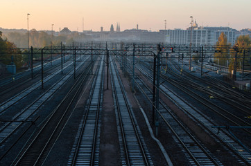 Morning light on tracks near central railway station in Helsinki