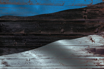 Estonia flag on an old wooden plank forming a background