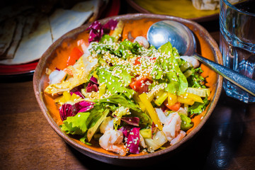 fresh salad with shrimps and vegetables