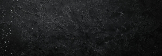 Black stone background. Stone texture. Top view. Free space for your text.