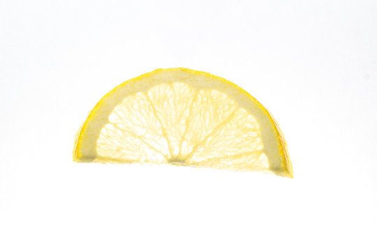 sliced lemon sliced on a white background isolate
