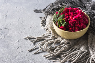  Food background. Christmas menu Beetroot salad - vinaigrette in a bowl, top view. Vegan cuisine. Diet menu