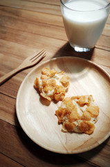 Cookies Cornflakes on Wooden Plate with Fresh Milk, Ready To Serve in Morning                                                                 