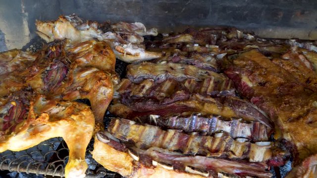 Grilled pieces of asado, a traditional Argentinian barbecue. PANNING RIGHT