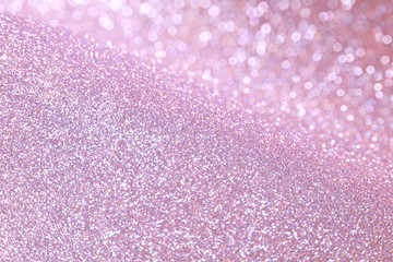 Snow Sparkle Glitter Lights Background. Lilac Silver Color. Shine Bokeh Effect. For party, holidays, celebration.