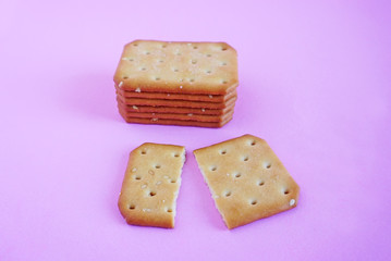 Cracker bread isolated on the pink scene or pink background