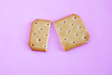 Cracker bread isolated on the pink scene or pink background