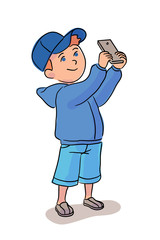 Little boy taking photo on mobile phone on white