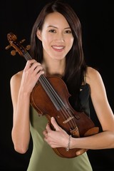 Young Woman Standing With Violin