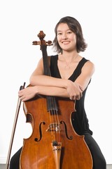 Female Artist Sitting With Music Instrument © MDBPIXS