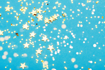 Trendy blue background with golden stars. The concept of celebrations, the Day of St. Valentine,...