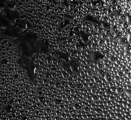 Drops of water on glass as a background