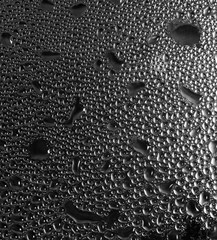 Drops of water on glass as a background