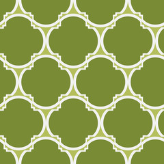 A seamless vector pattern with green geometric four leaves clover shapes. Surface print design.