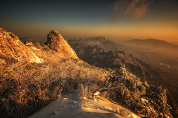 Fototapeta premium Bukhansan mountain in Winter landscape On a snow covered hill at Bukhansan National Park in Seoul, South Korea