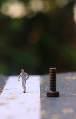 Illustration Photo, Cheap and Easy Sport in the morning, Alone Mini Figure Sport Man Toy at Asphalt...
