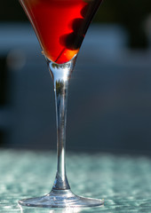 Cocktail glass still life:  Manhatten with cherries 