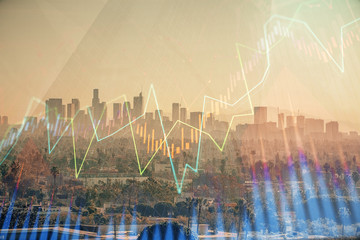 Forex chart on cityscape with skyscrapers wallpaper multi exposure. Financial research concept.