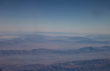Fototapeta premium Aerophotography of the rocky mountains from the airplane