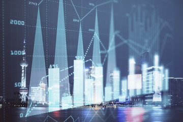 Financial graph on night city scape with tall buildings background double exposure. Analysis concept.