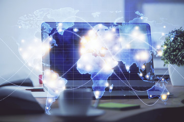 Multi exposure of business theme icons and work space with computer background. Concept of success.