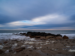 Fototapeta premium A Small Breakwater On A Beach In Sandwich Massachusetts
