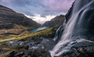 Waterfall at Saksun druning sunrise - Faroe Islands