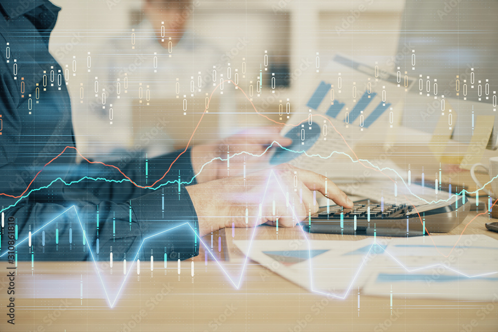 Poster Double exposure of graph with man typing on computer in office on background. Concept of hard work. Closeup.