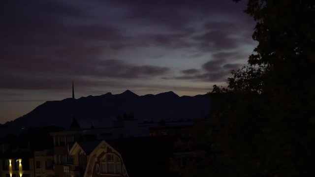 Sunrise at Kufstein over the city. Timelapse