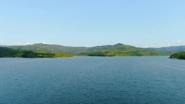 Lake Butoniga in Croatia panorama showing full high water level, Aerial drone flyover shot