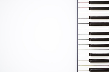 music template. keyboard synthesizer instrument on white background. Top view. Copy space