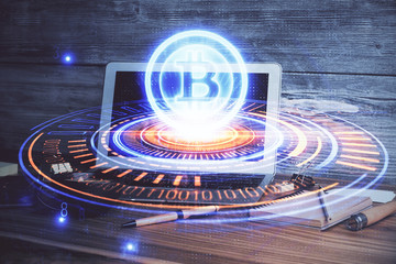 Multi exposure of blockchain theme hologram and table with computer background. Concept of bitcoin...