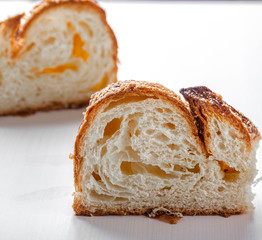 delicious cinnamon bun on the white table