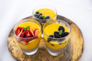 Chia pudding and Mango smoothie with fruit topping
