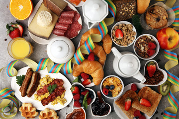 Breakfast served with coffee, orange juice, croissants, cereals and fruits. Balanced diet. Continental breakfast on carnival or new year