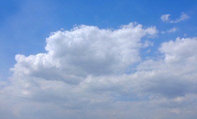 Fototapeta premium Blue sky and fluffy clouds background.