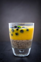 Chia pudding and Mango smoothie with blueberry topping