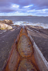 HDR The old lifeboat slipway at Ramore opposite The Skerries, Portrush, Causeway coastal route,...