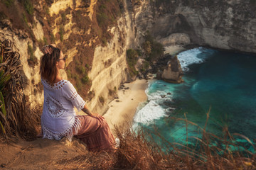 Woman enjoying view of Diamond Bay, Nusa Penida island, Indonesia