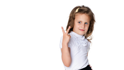 Obraz na płótnie Canvas Little girl holding her thumb up