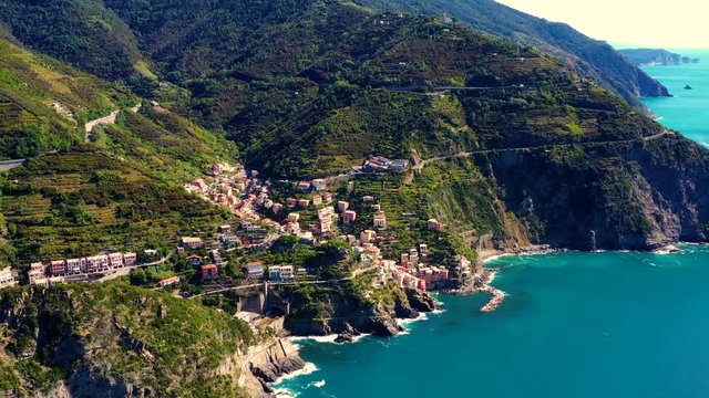 Riomaggiore Cinque Terre is a traditional and colorful fishing village near a cliff on the Mediterranean Sea, located on the Ligurian coast in Italy. Riomaggiore is one of the best travel villages of 
