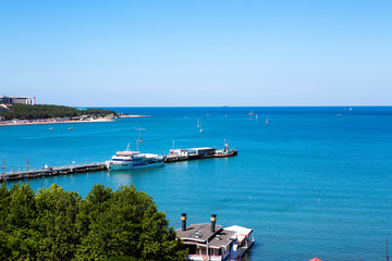 Panorama of the resort of Gelendzhik, the Black sea. Gelendzhik Bay. sea pier with standing pleasure ships and yachts. 