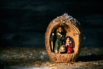 the holy family in a rustic nativity scene
